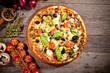 Delicious fresh pizza served on wooden table