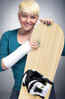 snowboarder   with arm in cast
