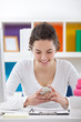 Foto: Smiling teenager girl with phone Smiling teenager girl with phone