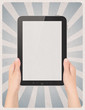 Foto: Digital tablet in hands on retro background Digital tablet in hands on retro background