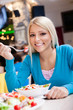 woman is eating salad