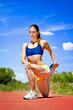 Sporty woman Stretching Quadriceps