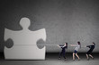 Foto: Businesswomen teamwork pull a puzzle Businesswomen teamwork pull a puzzle