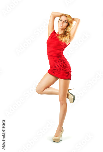 Photo: Beautiful Woman in Red Dress Isolated on White Beautiful Woman in Red Dress Isolated on White