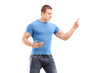 An anger young man pointing with finger and threatening