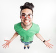 funny man with hipster glasses showing his palms and smiling