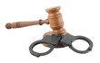 Gavel and handcuffs isolated on white