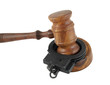 Gavel and handcuffs isolated on white