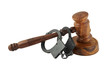 Gavel and handcuffs isolated on white