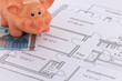 Foto: Sparschwein und Grundriss Sparschwein und Grundriss