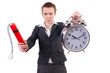 Businesswoman with dynamite and clock