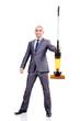 Photo: Businessman doing vacuum cleaning on white Businessman doing vacuum cleaning on white