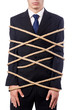 Businessman tied up with rope on white