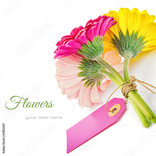 Photo: Colorful gerbera flowers with gift tag Colorful gerbera flowers with gift tag