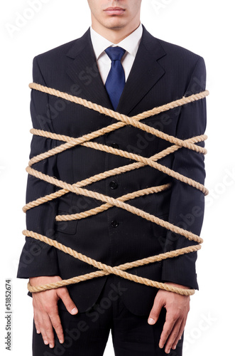 Photo: Businessman tied up with rope on white Businessman tied up with rope on white