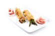 bunch of asparagus rolled with  puff pastry and speck