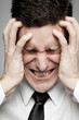 Businessman in white shirt expressing problems.
