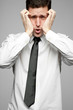 Businessman in white shirt expressing problems.