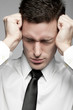 Businessman in white shirt expressing problems.