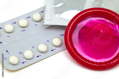 Photo: birth control pills and condoms birth control pills and condoms