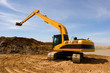 Orange excavator at construction site