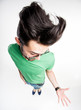funny man with wierd hairstyle showing his palm - wide angle