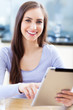 Woman using digital tablet