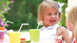 Young Girl Enjoying Food At Party