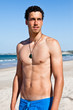 Handsome fit young man on the beach