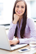 Businesswoman using laptop