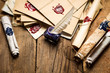 Photo: Ancient scrolls and old envelope with blue inkwell Ancient scrolls and old envelope with blue inkwell
