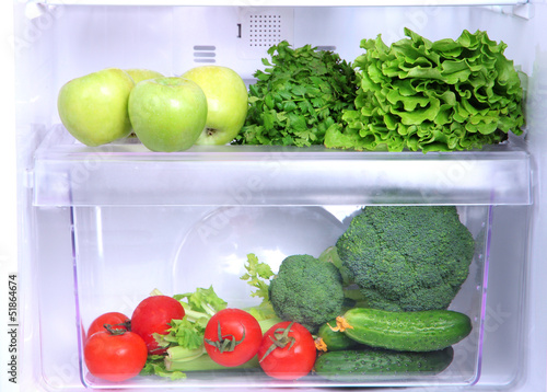 Photo: Open refrigerator with vegetarian food Open refrigerator with vegetarian food