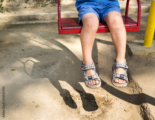 Photo: Foot baby on swing Foot baby on swing