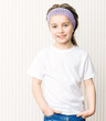 Photo: ittle girl in white t-shirt ittle girl in white t-shirt