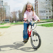 little girl with her bicycle