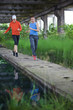 man and woman running training