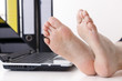 Bare feet on the desk