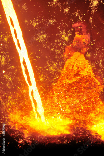 Photo: Molten hot steel pouring Molten hot steel pouring