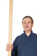 Foto: Man with wooden slat Man with wooden slat