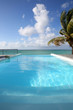 Closeup of infinity pool getting to the sea