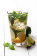 Photo: Fresh tasty mint mojito on a table Fresh tasty mint mojito on a table