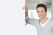 Portrait of handsome single man at home