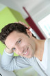 Photo: Portrait of handsome single man at home Portrait of handsome single man at home