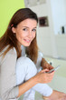 Relaxing at home and connected on internet