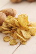 Foto: Rustic unpeeled potatoes and chips Rustic unpeeled potatoes and chips