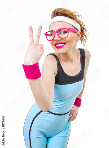 Photo: Smile young fit woman gesturing Smile young fit woman gesturing