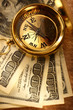 Golden vintage compass and money