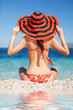 Young fashion woman rest on the beach