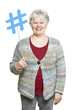 Senior woman holding a social media sign smiling
