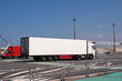 Large white lorry speeding from ferry